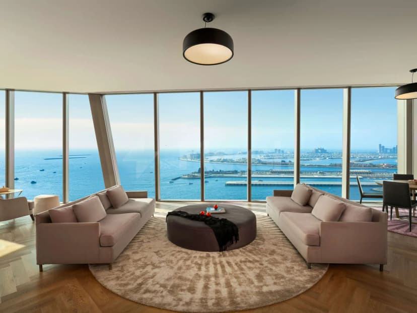 Meeting room at Rixos Premium Dubai JBR Hotel with floor-to-ceiling windows overlooking the sea and city skyline
