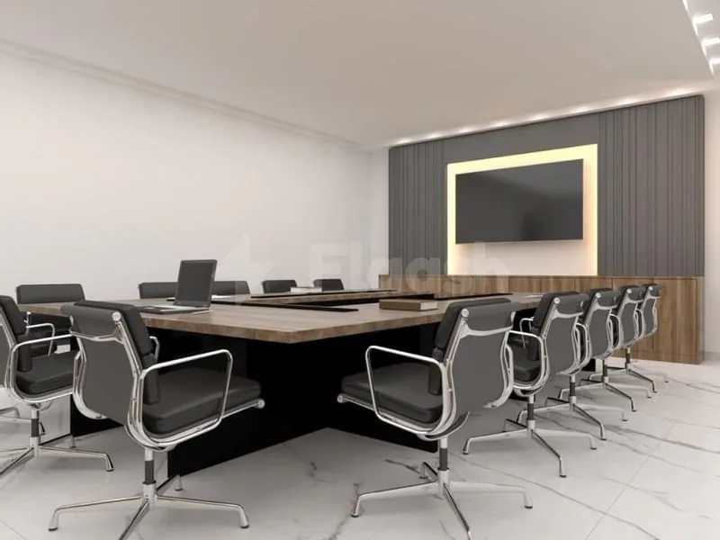 Boardroom at Cantonal Hotel by Warwick in Riyadh with backlit wall frame behind screen