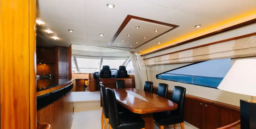 Dining area at Sunseeker 82 Why Not Yacht Dubai with large ocean-view window