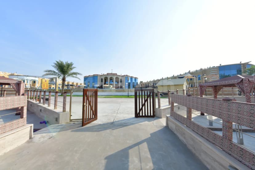 Rooftop terrace at Tio Sea Resort Qatar in Doha with patterned fabric canopies