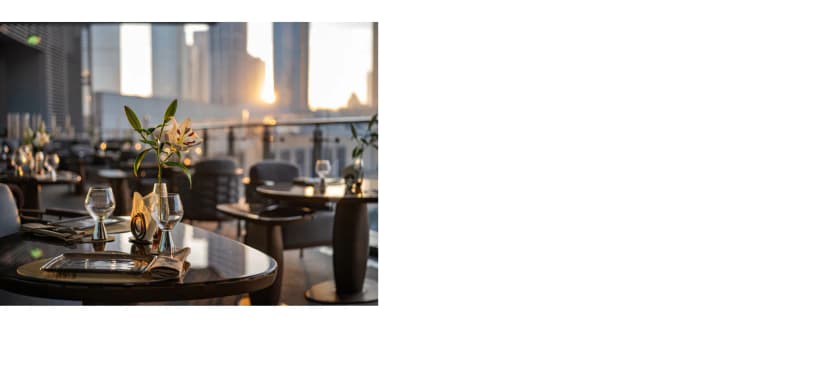 Rooftop terrace at Doors Dubai Mall Restaurant in Dubai with white lily centerpiece