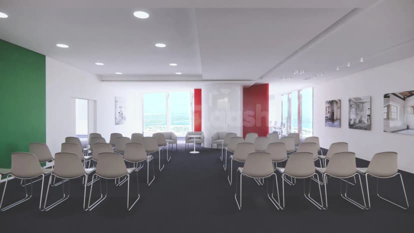 Meeting room at Italiacamp Dubai Hub for Made in Italy featuring grey chairs, black carpet, and large sea-view