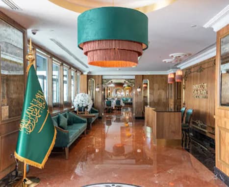 Entrance Hall at Entrecôte Café de Paris Restaurant Riyadh Al Faisaliah Tower featuring a green velvet pendant