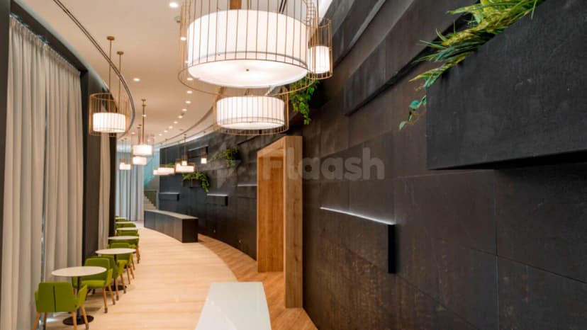 Restaurant at Conference Hall Dubai Knowledge Park in Dubai with black stone wall and recessed lighting