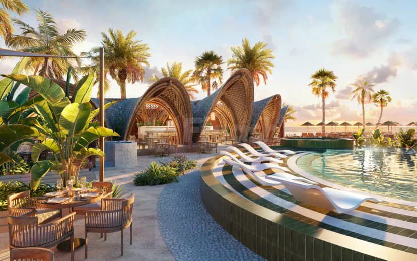 Rooftop terrace at Kaimana Restaurant and Beach in Dubai with curved green-tiled pool edge
