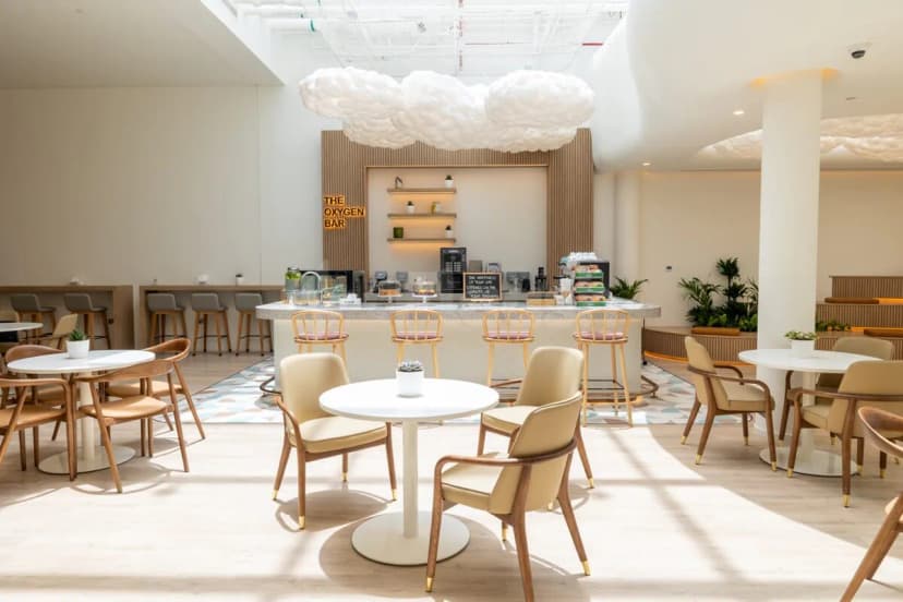 Cloud-shaped ceiling fixture in Cloud Spaces Circle Mall Dubai restaurant, featuring an oxygen bar sign and white round