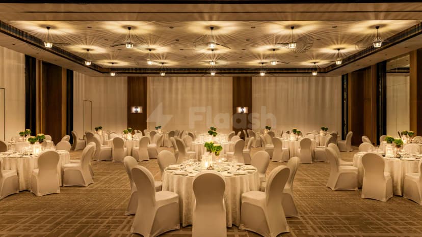 Ballroom at Le Royal Meridien Beach Resort & Spa in Dubai with decorative ceiling fans and warm lighting