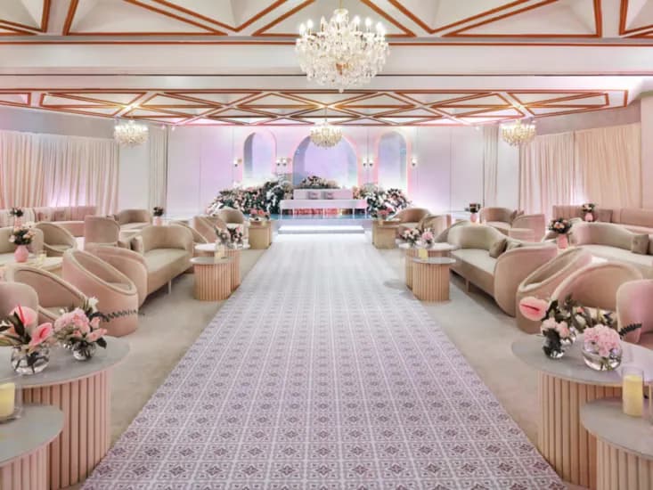 Ballroom at InterContinental Al Jubail in Al Jubail featuring a patterned runner carpet and ornate ceiling beams