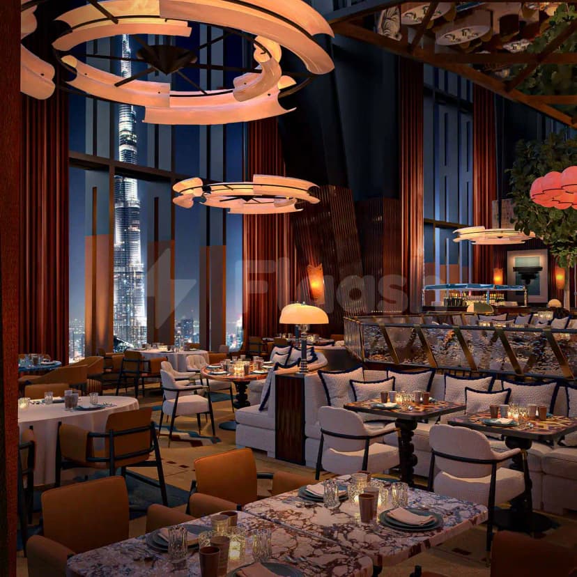 Restaurant at ICD Brookfield Place Dubai featuring marble tables, candlelit settings, and a prominent Burj Khalifa view