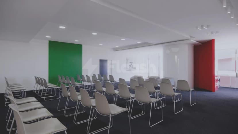Meeting room at Italiacamp Dubai Hub for Made in Italy with green accent wall