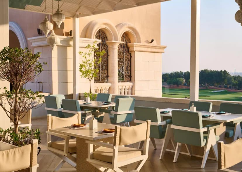 Rooftop terrace at Jumeirah Golf Estates in Dubai with ornate metal window grilles