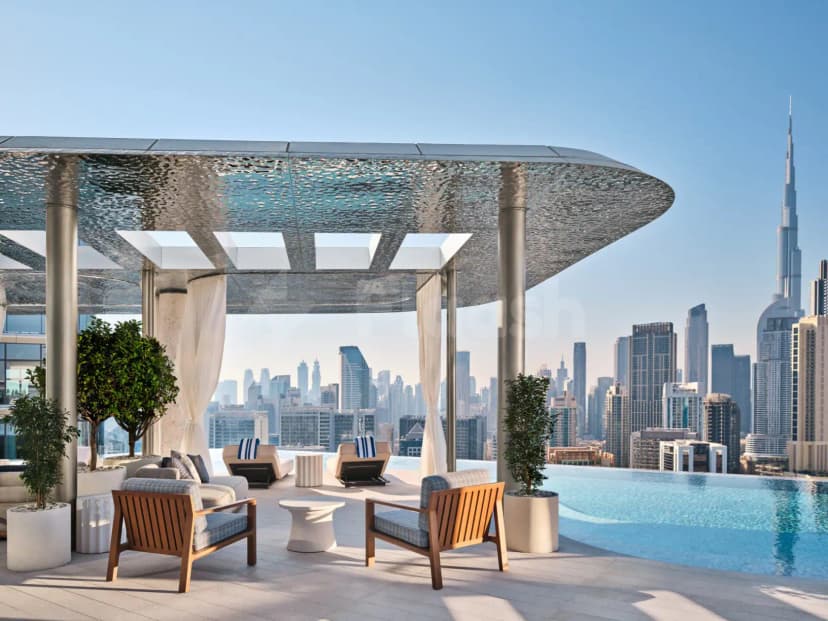 Rooftop terrace at Riviera By Jean Imbert Dubai Business Bay with infinity pool and Burj Khalifa view