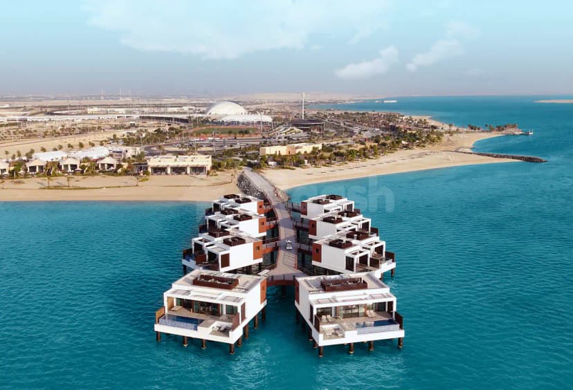 Overwater villas at Bab Al Nojoum Hudayriyat Camp in Abu Dhabi feature private plunge pools and wooden stilts