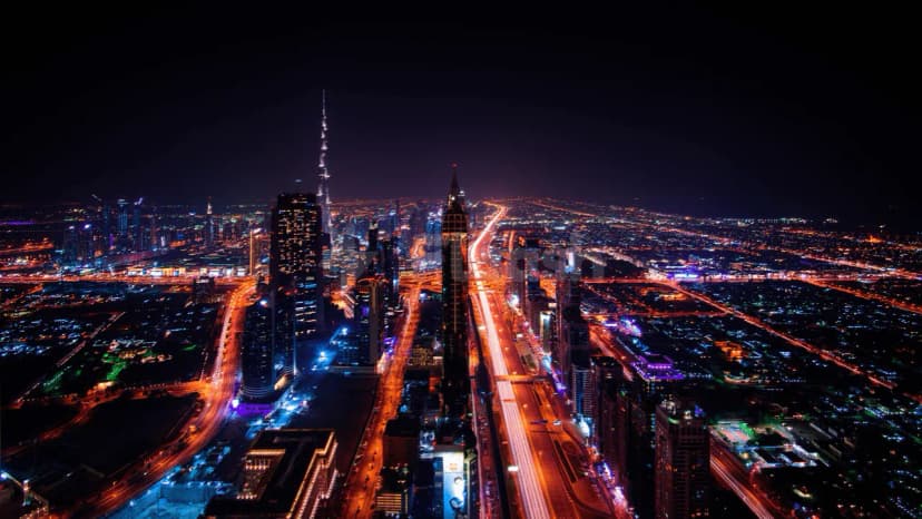 Rooftop terrace at Italiacamp Dubai Hub for Made in Italy overlooking Burj Khalifa and illuminated city highways