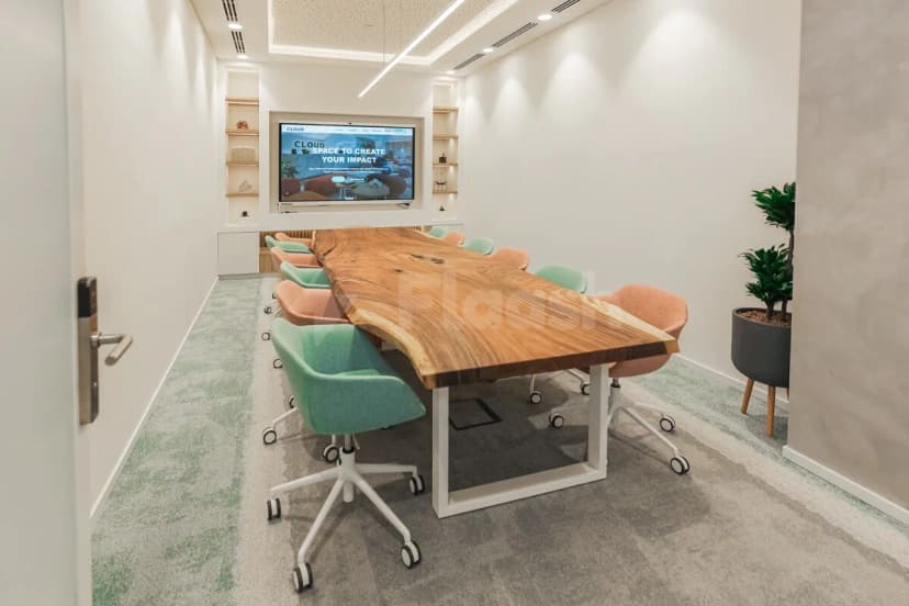Boardroom at Cloud Spaces Mall World Trade Center Abu Dhabi with live-edge wooden table