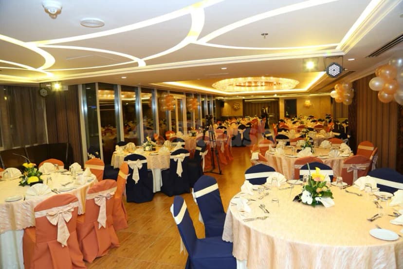 Ballroom at Ivory Grand Hotel Apartments in Dubai with recessed ceiling lighting and balloon decorations