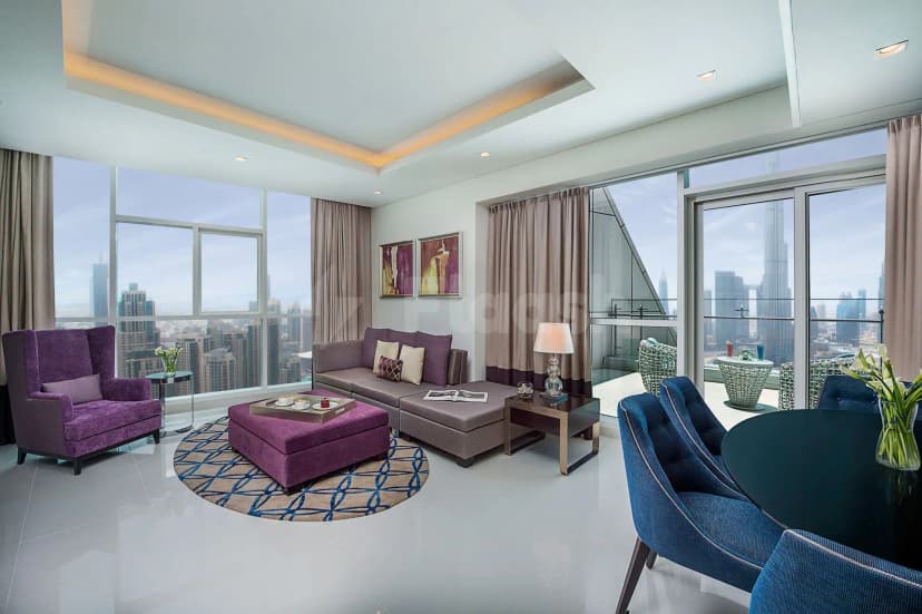Meeting room at Blooms Ava Restaurant in Dubai featuring floor-to-ceiling windows with city skyline view