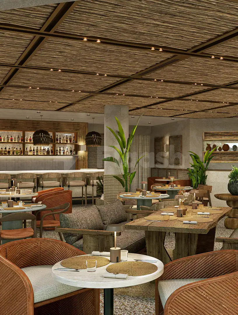 Peaches & Cream Beach Restaurant Dubai features a thatched ceiling and woven rattan chairs in its open dining space