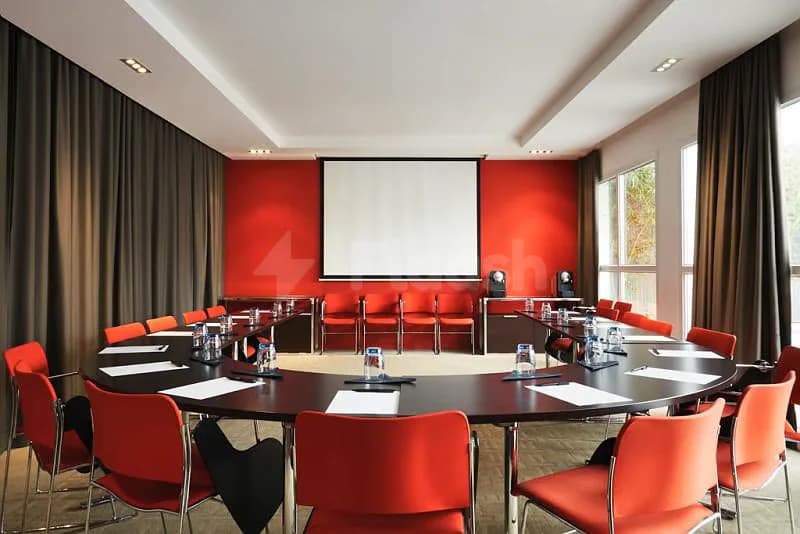 Boardroom at Adagio Jumeirah Village Triangle in Dubai with large projection screen