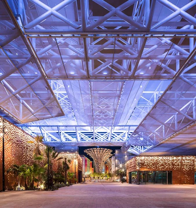 Entrance hall of Connect Conference Centre, Expo City Dubai, featuring a glass ceiling with white metal truss structure