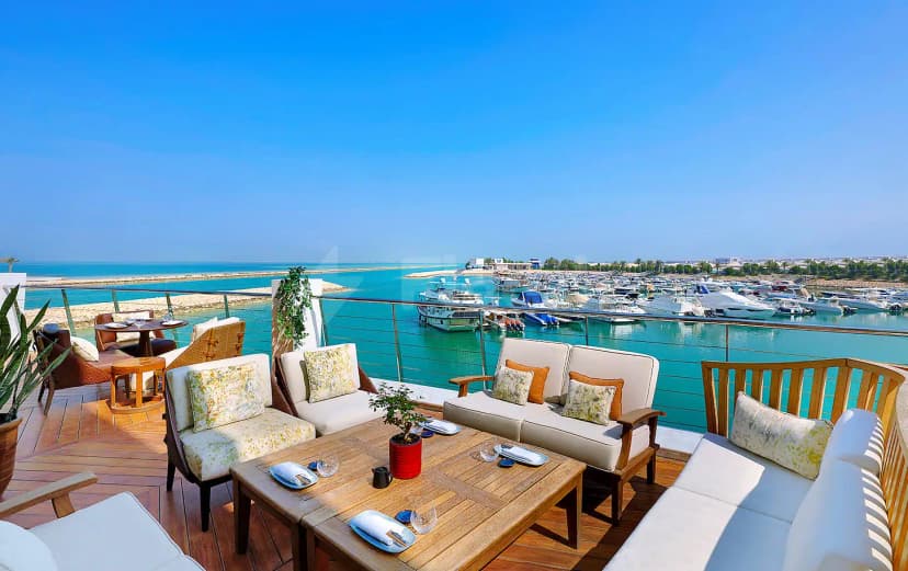 Rooftop terrace at B Lounge Doha in Doha with marina view