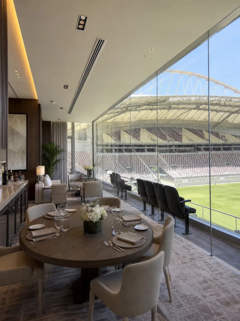 Private hospitality setting in Qatar for corporate guests at a sporting event.
